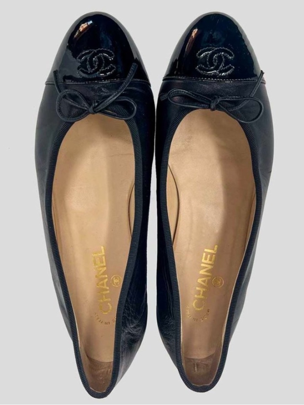 CHANEL Black Patent Cap-Toe Ballet Flats with Bow